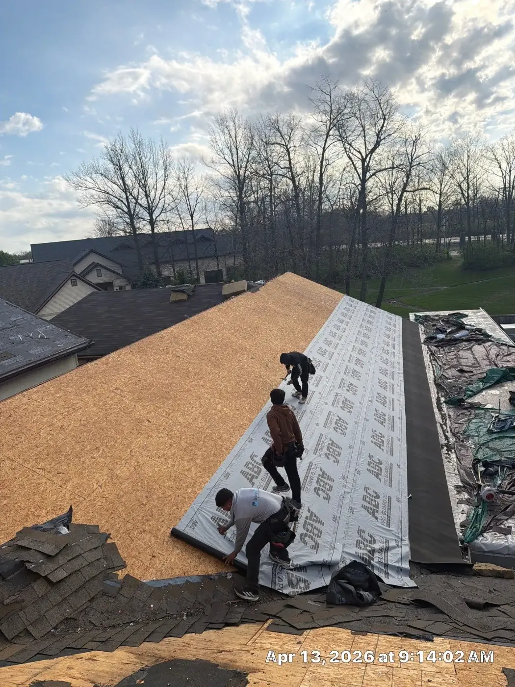 Tarping and dry-in on a Upland commercial roof